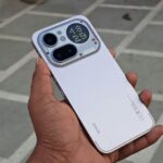 Close-up of a modern smartphone showcasing rear display and camera features.